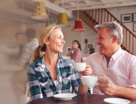 Happy couple in a cafe