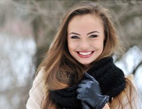 Happy woman in the snow