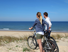 Couple cycling from Surrey to Delta