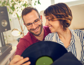 Couple choosing records together