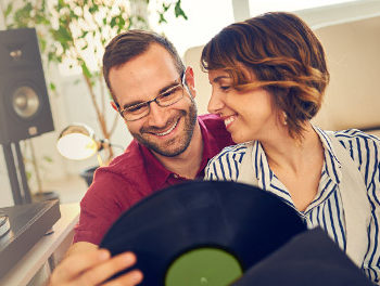 Couple choosing records together