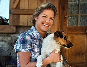 Single farmer with her dog