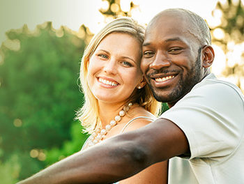 black and white couple smiling togetherBlack and White Dating: A Safe Place To Date Who You Want