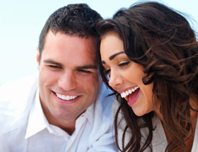 couple looking happily at something