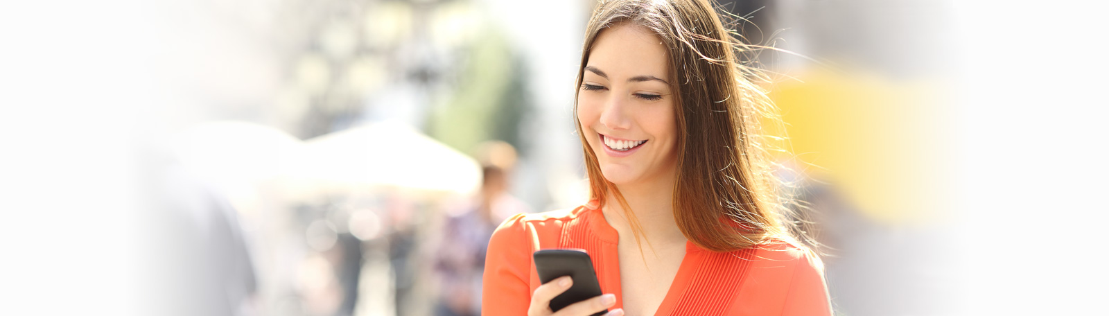 Woman using a dating app on her phone