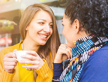 Lesbian coupe deeply in love staring into each other's eyes