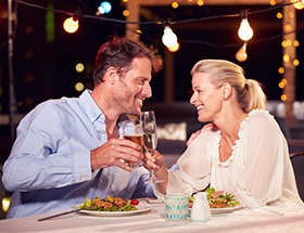 Man and woman having dinner together