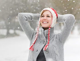 Happy woman in the snow