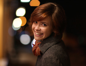 Pretty short haired woman smiling at the camera