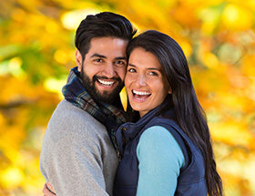 Happy Indian couple in the park