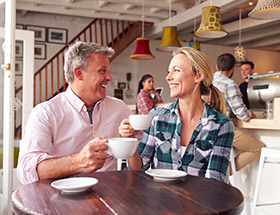 man and woman on a coffee date