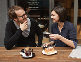 Couple on a first date in a cafe