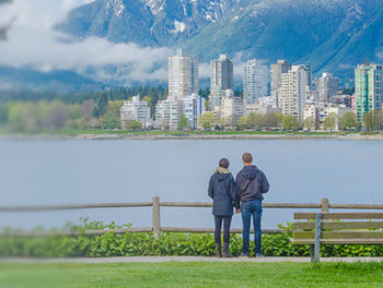 Couple looking out over the Vancouver skyline